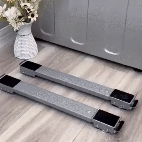 Soportes colocados en el piso junto a la lavadora antes de desplazarla